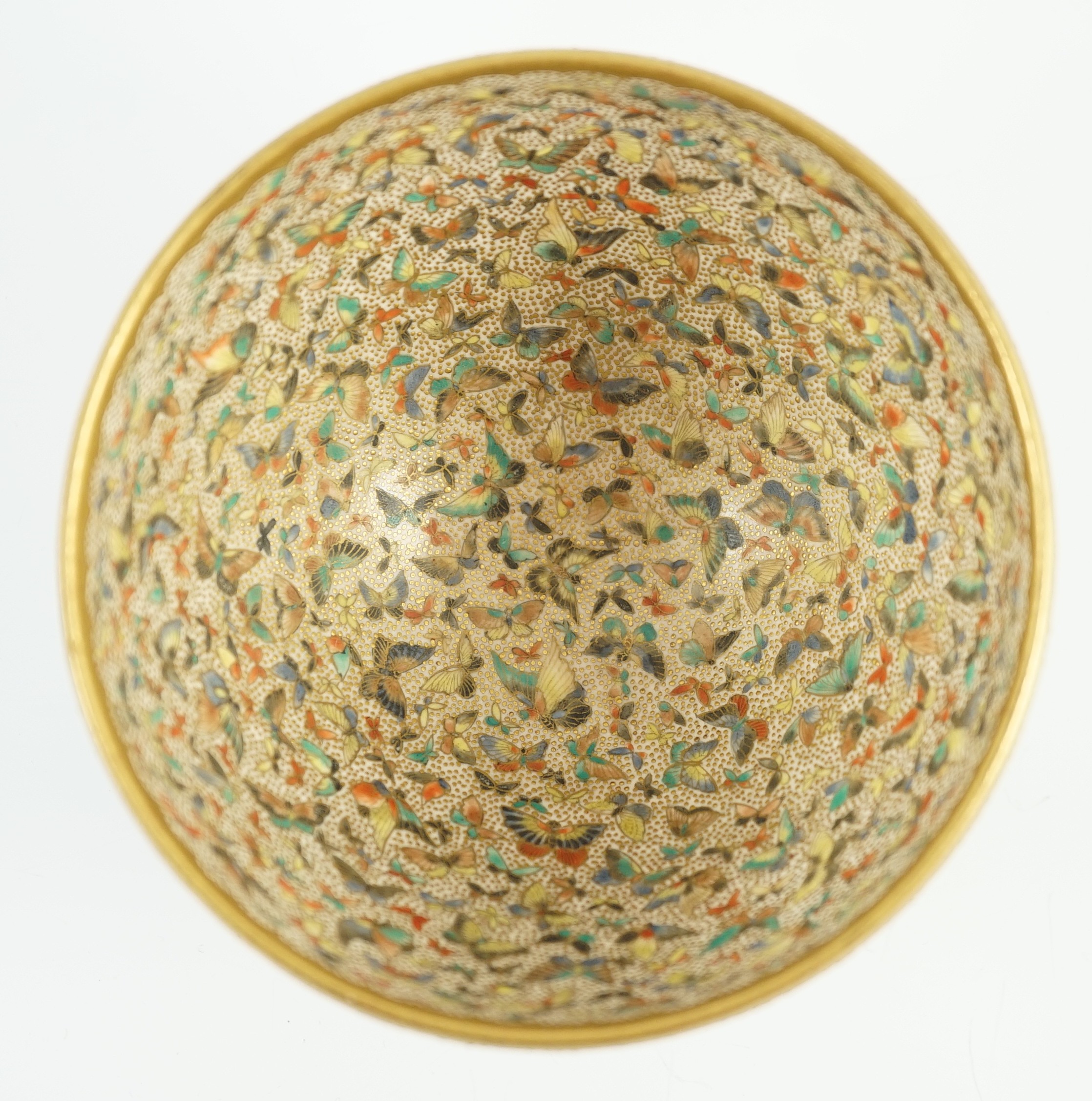 A Japanese Satsuma pottery ‘thousand butterfly’ bowl, Meiji period, 11cm diameter